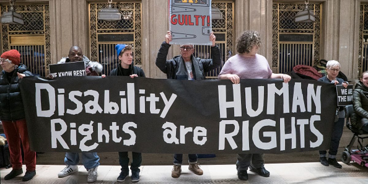 View of demonstrators as they hold a banner (that reads 'Disability Rights are Human Rights') during the Non-March For Disabled Women inside Grand Central Station, New York, New York January 19, 2019. (Photo by Barbara Alper/Getty Images), New York, New York January 19, 2019. (Photo by Barbara Alper/Getty Images)